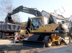 Ремонт колесного экскаватора Volvo EW180B 2-Piece Boom Ремонт колесного экскаватора Volvo EW180B 2-Piece Boom